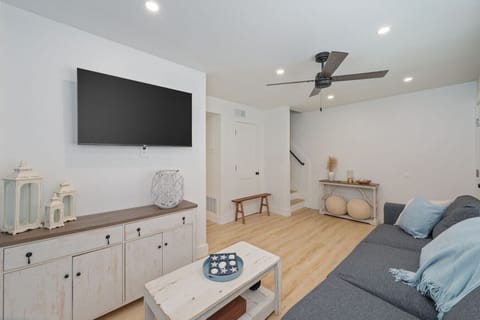 Cozy living room with a TV, perfect for relaxing after a day outdoors