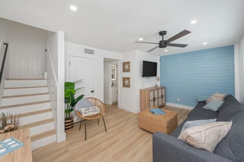 Cozy living room with a TV, perfect for relaxing after a day outdoors