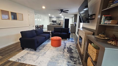 Added rug and ottoman 