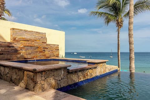 Infinity pool with ocean backdrop