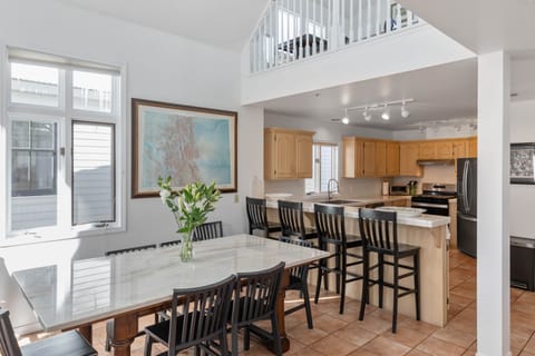 The kitchen is open to the dining and living area of the home