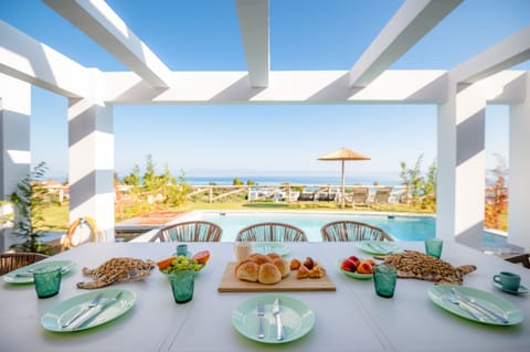 Breakfast by the pool with a view%21