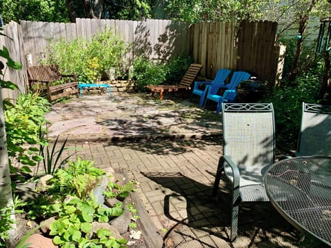 Comfortable outdoor space is shared with downstairs tenants.