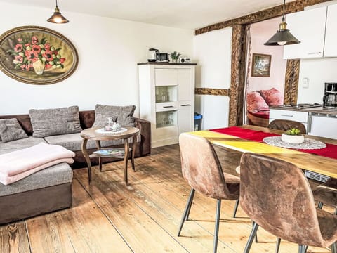 Furniture, Interior Design, Flooring, Floor, Wood, Room, Couch, Living Room, Table, Home