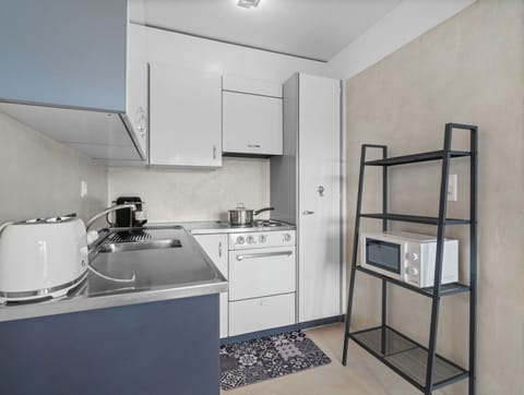 Interior Design, Wall, Flooring, Wood, Ceiling, Furniture, Floor, Room, Lighting, Apartment