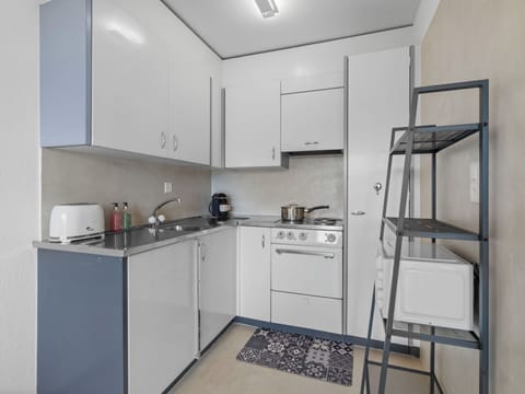 Interior Design, Wall, Flooring, Wood, Ceiling, Furniture, Floor, Room, Lighting, Apartment