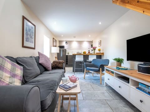 Furniture, Interior Design, Flooring, Couch, Wood, Floor, Living Room, Ceiling, Room, Table