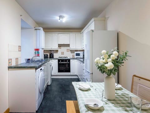 Interior Design, Furniture, Kitchen, Flooring, Major Appliance, Ceiling, Wood, Kitchen Appliance, Room, Floor