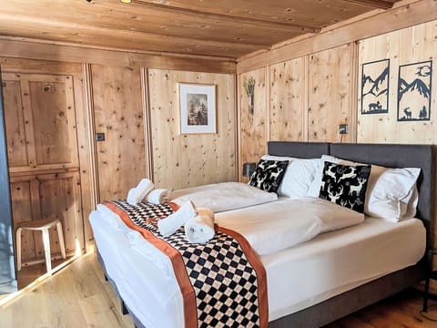 Furniture, Interior Design, Bedroom, Floor, Bed, Flooring, Bed Sheet, Bedding, Ceiling, Room