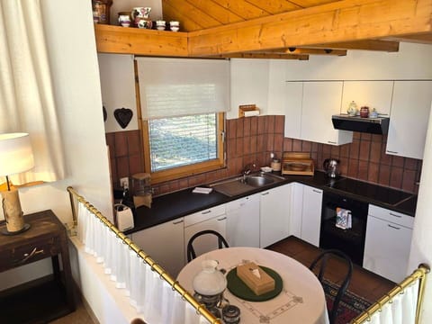 Interior Design, Wood, Kitchen, Furniture, Flooring, Countertop, Ceiling, Floor, Lighting, Kitchen Appliance