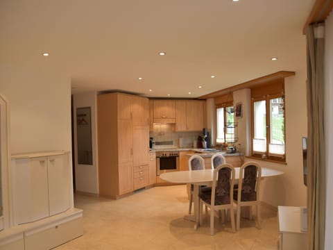 Furniture, Interior Design, Flooring, Floor, Wood, Kitchen, Ceiling, Cabinetry, Countertop, Chair