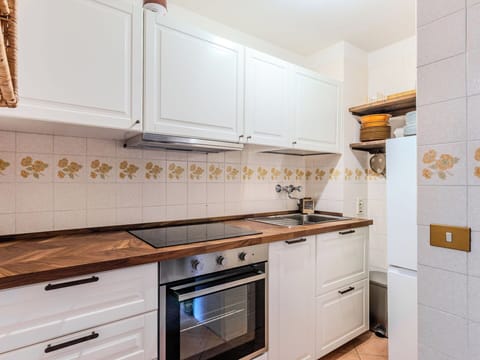 Kitchen, Flooring, Cabinetry, Wood, Countertop, Interior Design, Major Appliance, Floor, Kitchen Appliance, Home