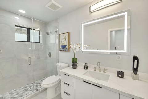 Step into a bright, spa-like sanctuary designed to refresh your senses and elevate your daily routine. This luxurious modern bathroom combines clean lines, premium finishes, and thoughtful touches to create the perfect space for relaxation.