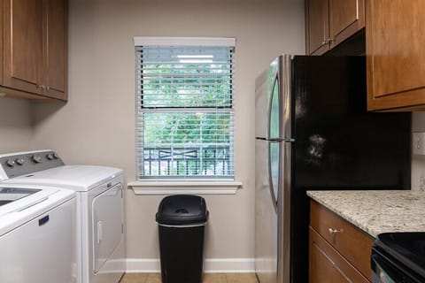 Includes laundry area.