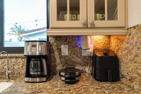Coffee maker, waffle iron, and air fryer—perfect for easy mornings.