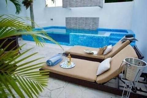 Relax in our comfortable poolside loungers and catch some ryas. 