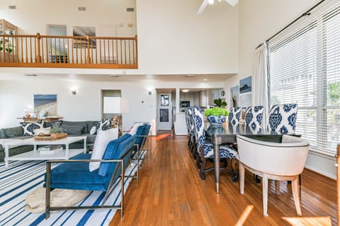 The dining table is right off the kitchen w seating for 8.