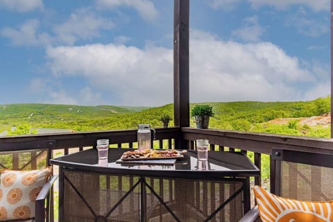 Soak in gorgeous Ozark Mountain views from your expansive covered patio!