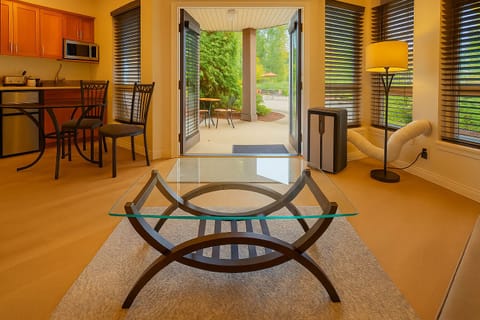 Natural gas fireplace and double glass doors to private deck.