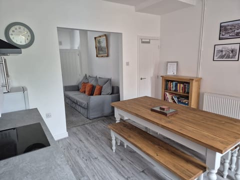 Dining table seating for six with garden views