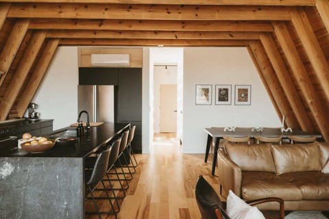 . This space reflects a commitment to thoughtful architecture and aesthetic balance, creating an inviting atmosphere for both relaxation and interaction.