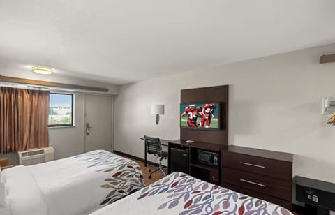 Start your evening with TV, desk space, and easy comfort.