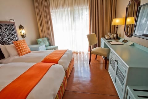 Settle in comfortably with twin beds and a calm work desk.