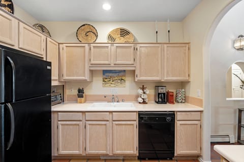Your fully equipped kitchen features everything you need to prepare meals, with a coffee maker ready for your morning brew and charming southwestern decor.
