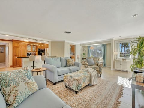 Open and Comfortable Family Room Layout with SmartTV and Table