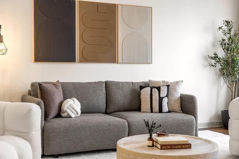 Cozy living area with modern decor, soft seating, and warm accents that create a welcoming and stylish space to relax.