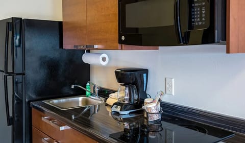 Start mornings with fresh coffee and a convenient mini-kitchen.