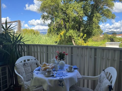 Furniture, Chair, Outdoor Table, Outdoor Furniture, Balcony, Shade, Serveware, Tablecloth, Kitchen & Dining Room Table, Yard