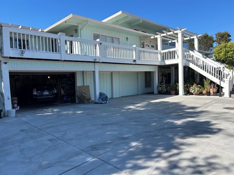 House front View from Parking lot. Upper & lower level entrance