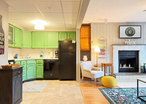 Fully equipped kitchen connected to the living room.