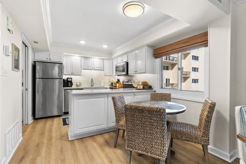 The open kitchen and dining area make meal prep and conversation go hand-in-hand.