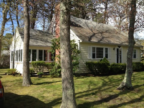 Three-season porch with adjustable windows to capture the perfect breeze.