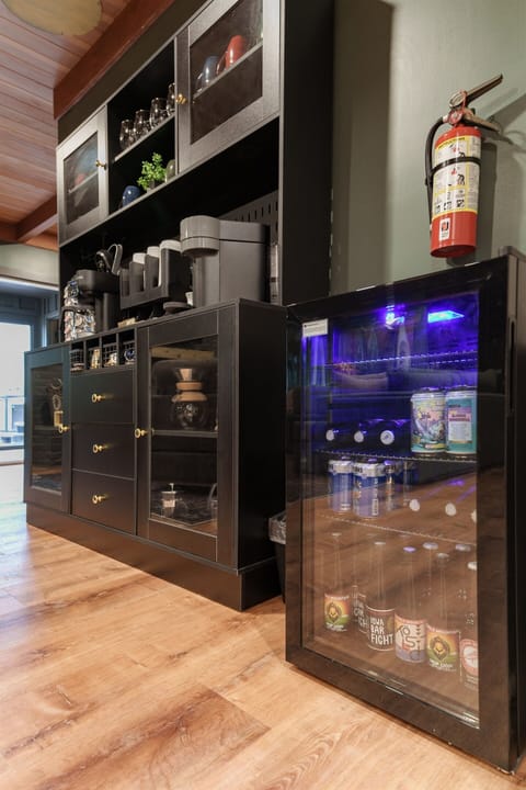 A full coffee station and dedicated beverage fridge make it easy to relax with a hot latte or an ice-cold drink anytime during your stay.