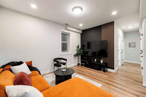 Comfy living nook w/ bold accents for laid-back lounging.