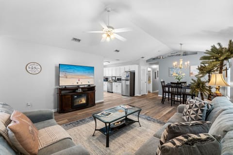 main Living room with smart TV, comfortable couches