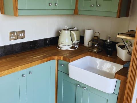A well-equipped kitchen with a sink