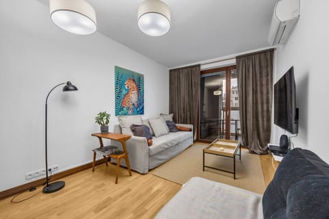 Comfortable Living Room with Two Sofa Beds, Balcony and Smart TV | Book Now with RENTUJEMY