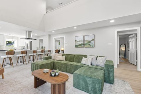 Comfortable Living Room with Plenty of Space and 75" TV