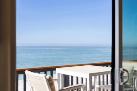 Step outside onto the balcony to enjoy fresh ocean air and stunning views, planning your day or simply unwinding as the sun sets.