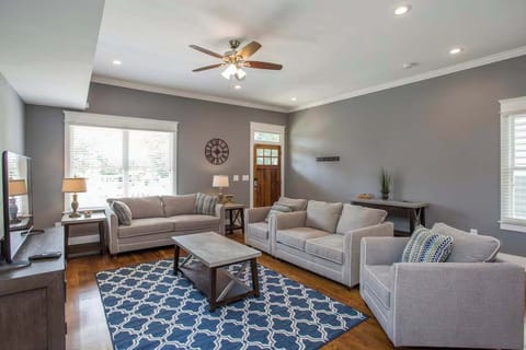 Living Room: Settle in and make yourself at home. Our charming living room offers comfort and style in equal measure.