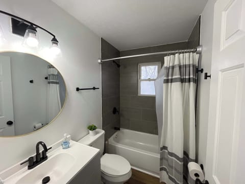 Full Bathroom: Our bathroom has it all – a bathtub, shower, sink, and toilet. And don't worry, we've also got toiletries ready for you.