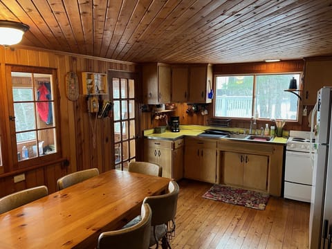 Open kitchen & Dining area stocked with everything you need ! 