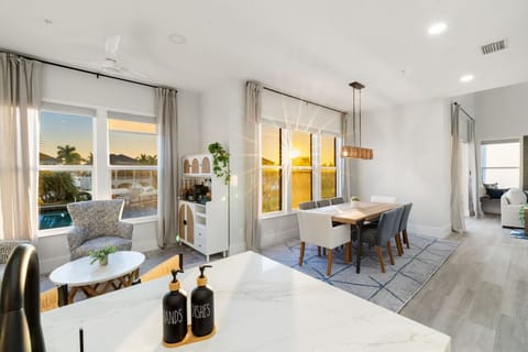 Sunny dining room with beautiful evening bay views