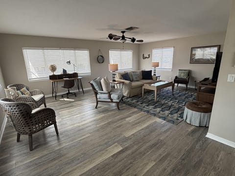 Spacious living room with cozy seating and natural light