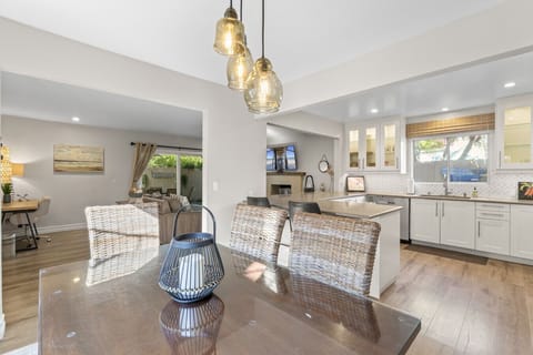 Bright open-concept living space with stylish seating and fully updated kitchen.