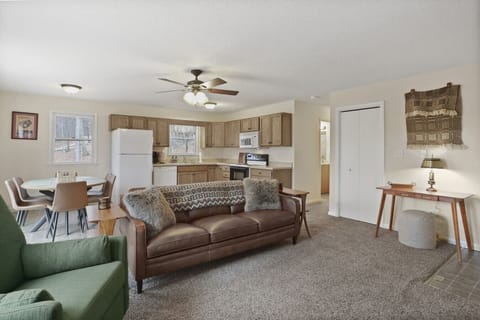 The living room, kitchen, and dining area.